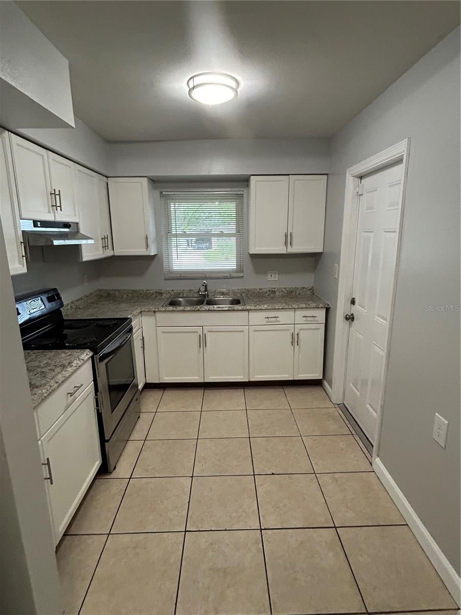 Photo of 1413 N Hudson Street, Orlando, FL 32808 (MLS # O6449109)