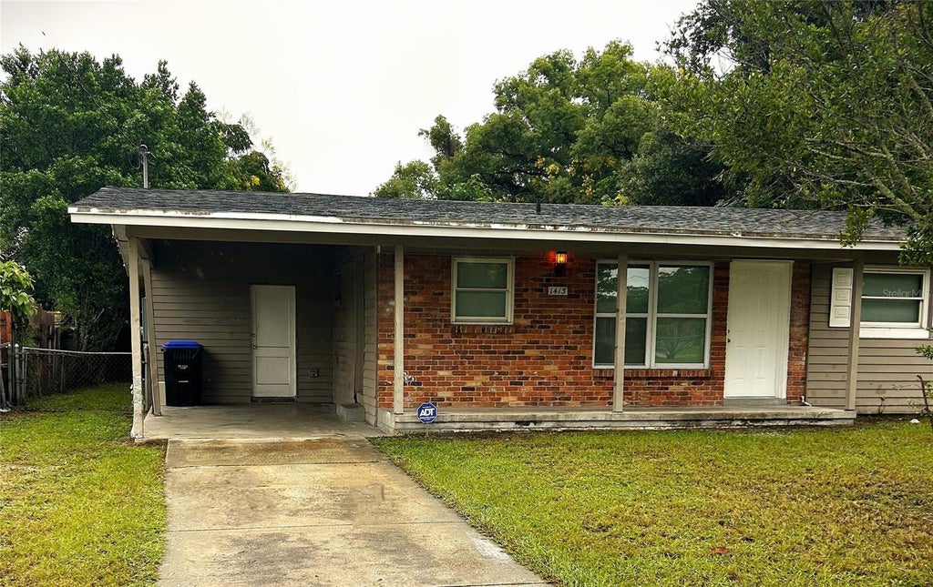 Photo of 1413 N Hudson Street, Orlando, FL 32808 (MLS # O6449109)