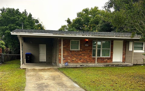 Photo of 1413 N Hudson Street, Orlando, FL 32808 (MLS # O6449109)