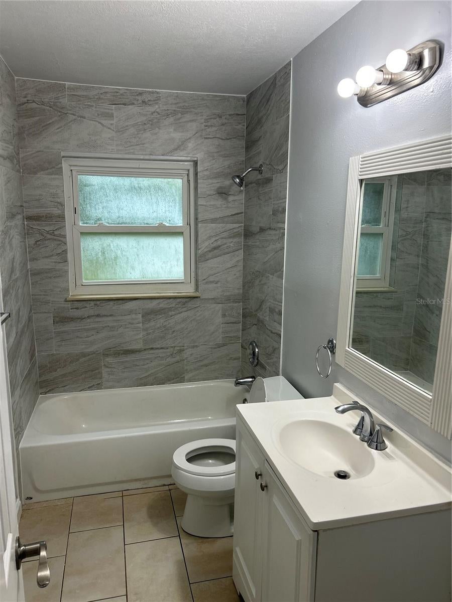 Photo of 1413 N Hudson Street, Orlando, FL 32808 (MLS # O6449109)