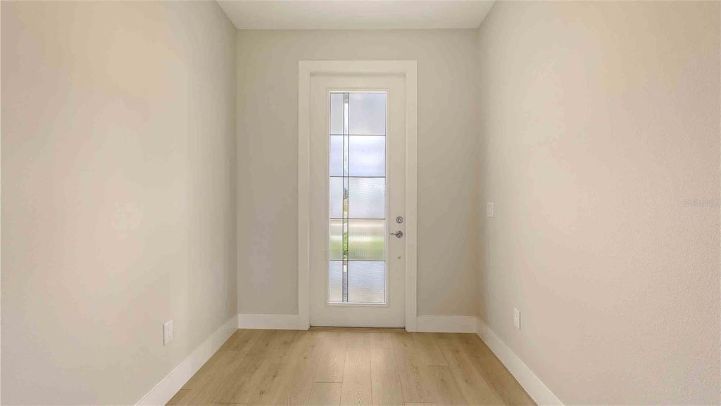 Photo of 14451 Coastal Woodland Lane, Parrish, FL 34219 (MLS # W7885054)