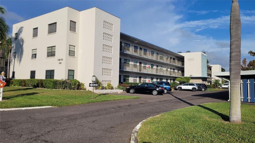 This fully furnished, very well maintained, two bedroom, two bath condo is ready for your move-in.   Located on the top floor, you will have no one above you.  Impact windows have been installed for your peace of mind.  A screened lanai is perfect for enjoying your morning coffee or watching the sunset with an adult beverage.  The Concord Building is near the far end of the complex so you would have very little traffic to contend with and parking is in an assigned covered carport.  Milestone Inspection and Structural Reserve study are complete with no required repairs.  Five Towns is a very active 55+ community with six pools, tennis and pickleball courts, bocce ball, and shuffleboard.  Two clubhouses include a billiard room and meeting rooms for the many activities offered here.  This complex is just minutes from the Gulf Beaches, shopping, restaurants, professional sports and entertainment venues.