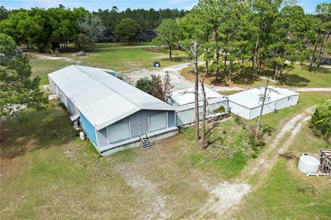 Tiny photo for 40945 Beach Rd, Eustis, FL 32736 (MLS # O6396224)