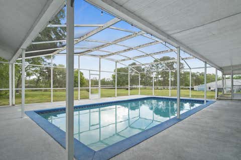 Tiny photo for 40945 Beach Rd, Eustis, FL 32736 (MLS # O6396224)