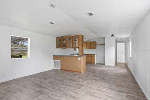 Tiny photo for 40945 Beach Rd, Eustis, FL 32736 (MLS # O6396224)