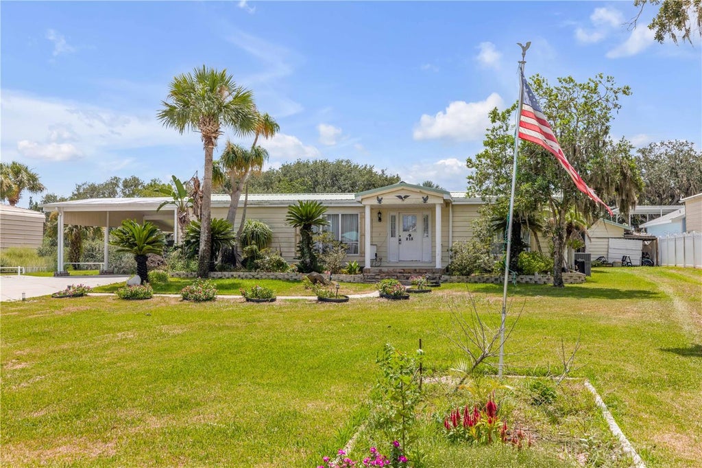 Photo of 215 Gary Avenue, Oak Hill, FL 32759 (MLS # NS1088703)