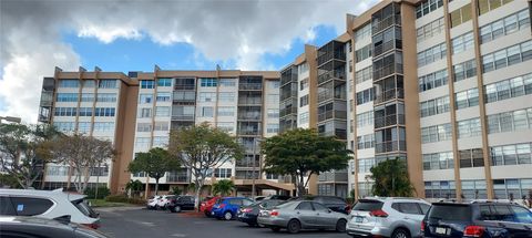 Photo of 1000 Saint Charles Place #209, Pembroke Pines, FL 33026 (MLS # O6387117)