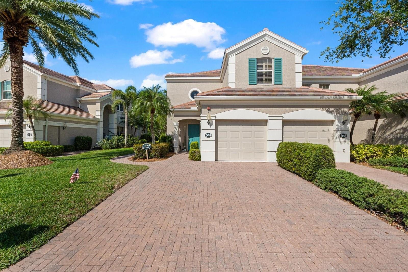 Don't miss this move in ready, beautiful three bedrooms and two bath condominium with PRIVATE ELEVATOR providing direct access from the first floor hall and attached garage. FURNISHINGS ARE INCLUDED! This spacious, 1,969 square feet property boasts wood-look laminate flooring throughout (no carpet), high ceilings, and an open, airy layout. The kitchen includes an eat-in area, a breakfast bar, solid surface countertops, Ray Routh cabinets, a tiled backsplash, and a closet pantry. A separate utility room features a full size washer/dryer and additional storage. The living space includes a great room plus flex space which is ideal for a den, dining room or game area. The primary bedroom is spacious, with two walk-in closets and a tray ceiling, paired with a primary bathroom offering dual sinks, a large soaking tub, and a separate walk-in shower. The additional two bedrooms are bright and equipped with large closets and ceiling fans and share a second bathroom with a tub/shower combo. The great room and breakfast nook open to a large, screened balcony featuring nature and preserve views. In addition to the garage and driveway parking, there are guest parking spaces located conveniently in the community. This lifestyle provides the benefits of homeownership without the traditional upkeep. Botanica is a gated, maintenance free luxury community which spans 28 acres of lakes and preserves, and features resort style amenities with a 4,000-square-foot clubhouse with a fitness center, library, kitchen, party rooms, two heated pools, and BBQ grills. It's a perfect location offering easy access to the Legacy Trail, Siesta Key Beach (about 10-30 minutes away), shopping (5 minutes to Costco and Publix), and downtown Sarasota (under 30 minutes), blending tranquility with convenience. Call for a private tour and make this your Florida home!