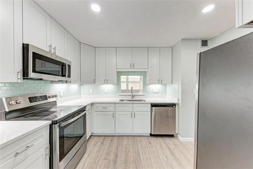 Photo of 6300 Flotilla Drive #105, Holmes Beach, FL 34217 (MLS # A4668176)