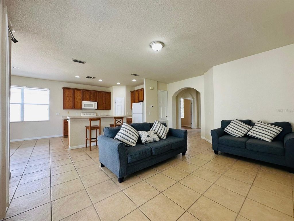 Photo of 4989 Bond Street W, Kissimmee, FL 34758 (MLS # O6354088)