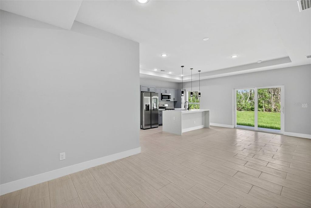 Photo of 625 Delmonico Street, Lehigh Acres, FL 33974 (MLS # O6350779)