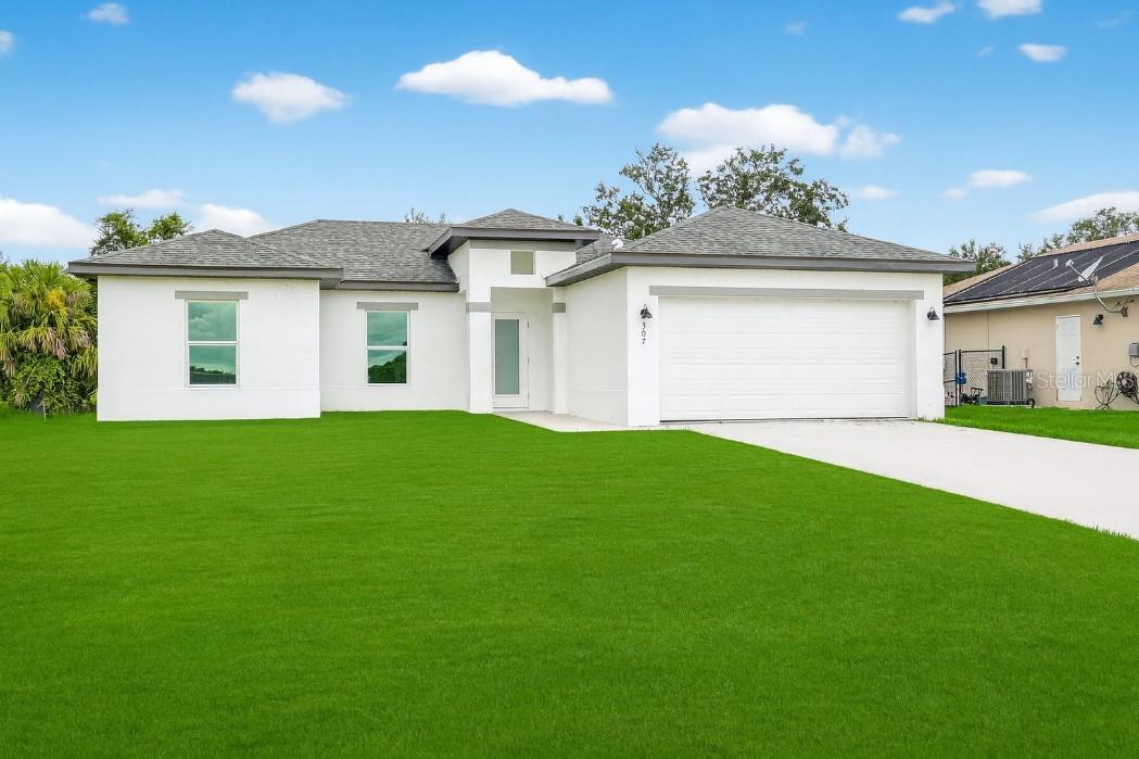 This move-in-ready property in Lehigh Acres, Florida, boasts several attractive features:
Impact Windows and Doors: The home is equipped with impact windows and doors throughout, a significant advantage in Florida's climate.
Modern Appliances: It includes stainless steel appliances and a washer and dryer, suggesting a modern and convenient living space.
Spacious Lot: The property sits on a 0.25-acre lot, providing ample space for outdoor living, including a potential patio area.
Living in Lehigh Acres
Lehigh Acres is known for its affordability and appeal to families and retirees seeking a warm-weather lifestyle without the high costs of coastal areas