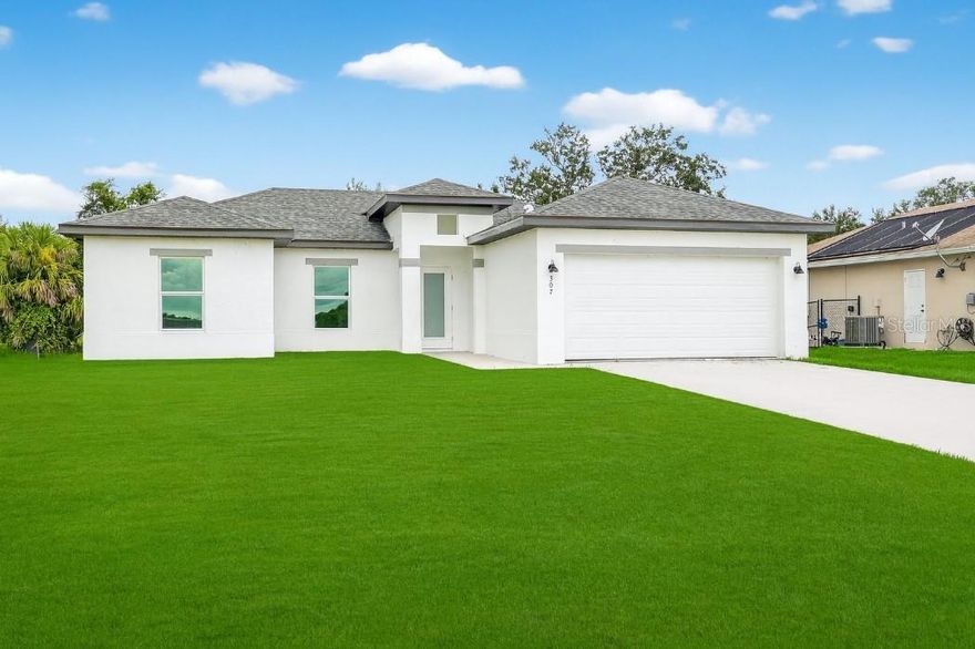 This move-in-ready property in Lehigh Acres, Florida, boasts several attractive features:
Impact Windows and Doors: The home is equipped with impact windows and doors throughout, a significant advantage in Florida's climate.
Modern Appliances: It includes stainless steel appliances and a washer and dryer, suggesting a modern and convenient living space.
Spacious Lot: The property sits on a 0.25-acre lot, providing ample space for outdoor living, including a potential patio area. 
Living in Lehigh Acres
Lehigh Acres is known for its affordability and appeal to families and retirees seeking a warm-weather lifestyle without the high costs of coastal areas