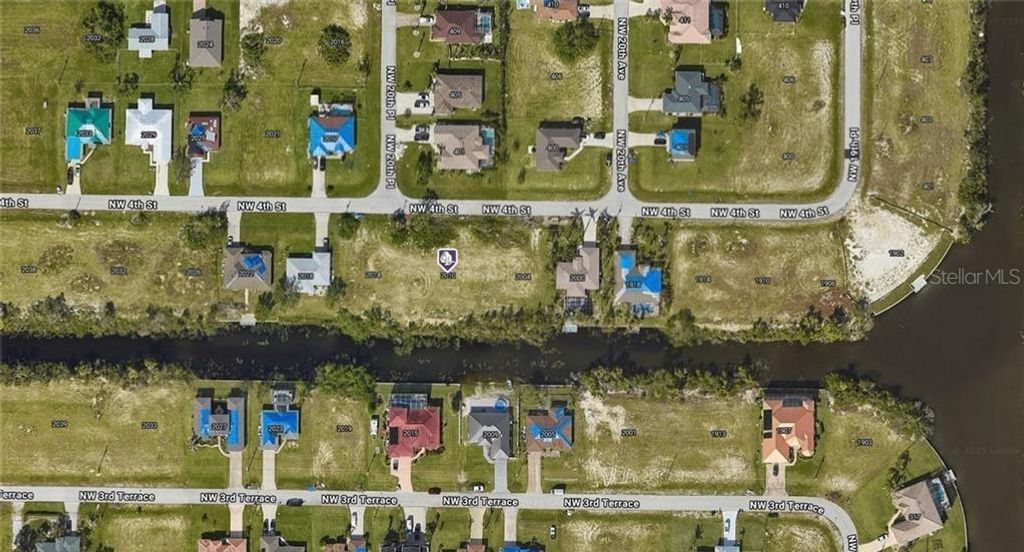 Photo of 2010 NW 4th Street, Cape Coral, FL 33993 (MLS # A4669503)