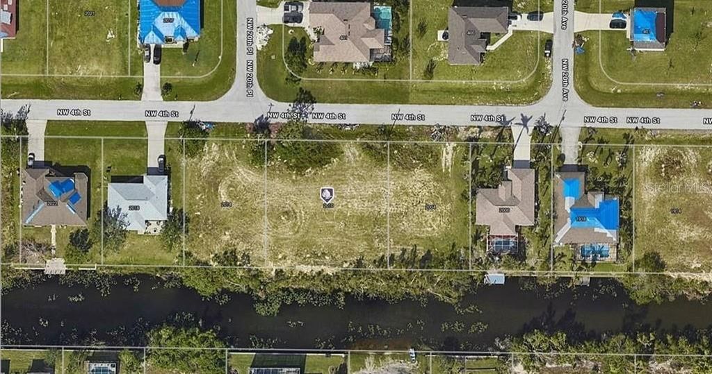 Photo of 2010 NW 4th Street, Cape Coral, FL 33993 (MLS # A4669503)