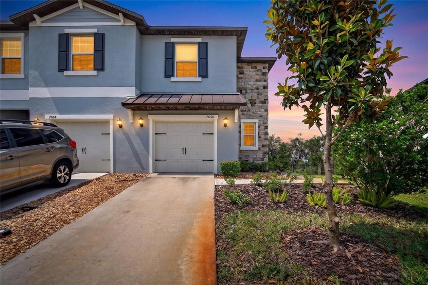 Welcome to this beautifully maintained Lennar Vale floorplan townhome located in the rapidly growing area of Zephyrhills, FL! Nestled within a gated community, this 3-bedroom, 2.5-bath home offers the perfect combination of comfort, security, and convenience. Step inside to an open-concept layout featuring a spacious kitchen overlooking the dining and living areas — perfect for entertaining or everyday living. Upstairs, you’ll find a versatile loft space ideal for a cozy office, den, playroom, or second living area. Enjoy peaceful tree-lined views from your screened-in patio with direct access to the community walking trail located right behind the property — perfect for morning walks, pets, or simply enjoying the outdoors. This home is loaded with upgrades, including a full interior and exterior security system for added peace of mind, a water softener, reverse osmosis water system providing cleaner, better-tasting water, an electric vehicle charging station, and solar panels that help provide long-term energy savings and lower monthly utility costs — a huge bonus for modern living. Residents enjoy a quiet and safe neighborhood with HOA-maintained lawn care, internet and resort-style amenities including a community pool, park, and walking trails. Perfect for first-time buyers, growing families, or anyone looking for low-maintenance living in a thriving location. The true standout feature? An assumable VA loan at an incredible 4.75 interest rate — offering qualified buyers a rare opportunity in today’s market. Don’t miss your chance to own this move-in-ready home in one of Zephyrhills’ most desirable communities!