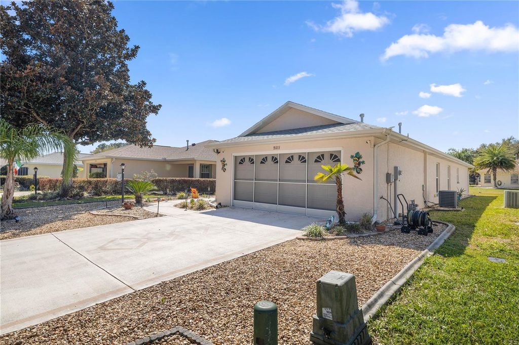 Photo of 9511 SW 93rd Loop, Ocala, FL 34481 (MLS # OM723622)