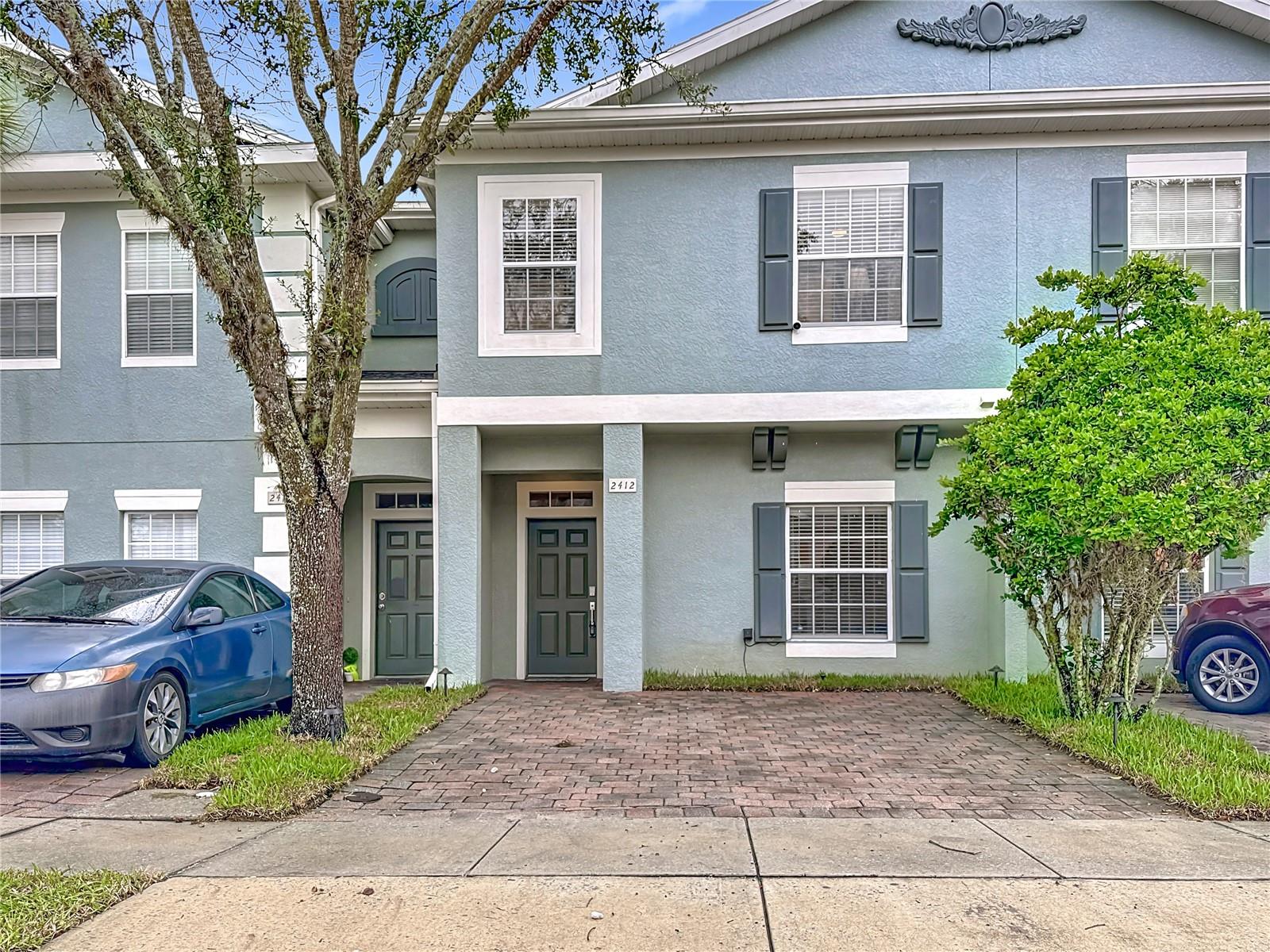 Looking for a fully furnished, income-producing investment property near Disney? This turnkey 4-bedroom, 3-bathroom townhome is the perfect opportunity! Ideally located in the gated Coral Key Resort in Kissimmee, you’re only minutes from Walt Disney World and Orlando’s top attractions. The home features an open-concept main living area where the kitchen, dining, and lounge flow seamlessly together—great for gathering with family or guests. A convenient first-floor bedroom and full bath provide flexibility, while upstairs you’ll find the spacious primary suite, two additional bedrooms, and a loft area perfect for a game room or extra lounge space.
Step outside to your private screened lanai with Jacuzzi, an inviting spot to unwind after a day at the parks. Guests and owners also enjoy access to the community’s clubhouse and resort-style pool, making this a sought-after vacation destination.
Recent updates include a new roof (2024), water heater (2025), washer & dryer (2024), and stove (2024)—giving you peace of mind and reduced maintenance costs. Currently operating as a short-term rental, this property offers both immediate income and long-term potential. Whether you’re seeking a vacation retreat or a proven investment, this home is ready for you—schedule your showing today!