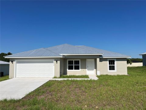 Photo of 406 Aston Martin Drive, Sebring, FL 33872 (MLS # OM717659)