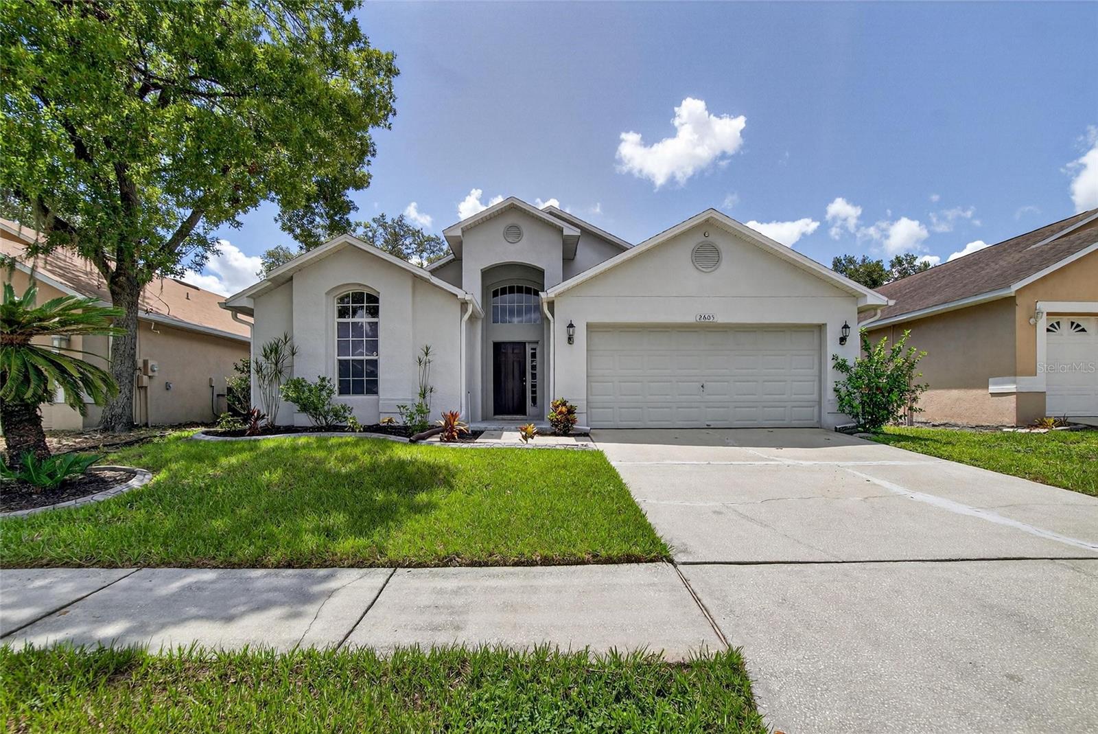 This Charming Move in Ready Home Has Everything You Need. Nestled In a Sought out Neighborhood Off Bloomingdale In Valrico Florida, renowed for the accessibilty to all major conveniences and its neighborly community. This 3 Bedroom 2 Bathroom 2 Car Garage Offers Peace Of Mind with Your Major components recently updated: Water Heater 2024, Air Conditioner July 2023,Water Softener 2022,Replumbed March 2023, Roof 2017. As You Enter in the Home, you will be Greeted by an Inviting Wide Foyer and you will notice two Ample Size Bedrooms/Shared Bathroom on the Left Front Side of the Home. Offering you Guests and Family Members Privacy from the rest of the House. As you reenter the foyer and take a few steps you will approach a True Open Concept Living Area. Composed of the Living Room,Dining Room, Dinette and Kitchen. The Kitchen Features Stainless Steel Appliances, Corian Countertops, and Plenty of Wood Cabinets. The Living Room offers Valuted ceilings,large windows overlooking the Back Yard and Door to access your Extended Screened Lanai. The Primary Bedroom is located in the Back Right Side of the Home and features and Large Walk in Closet and Ensuite. The Primary Bathroom has Dual Sinks, Garden Bath, Separate Shower Stall and Water Closet. Step outside to your Extended Screened Porch and Fenced Yard to enjoy your morning coffee or a peaceful evening. Home is located Minutes from the YMCA and access to the US 301, HWY 60, and crosstown expressway are just minutes away