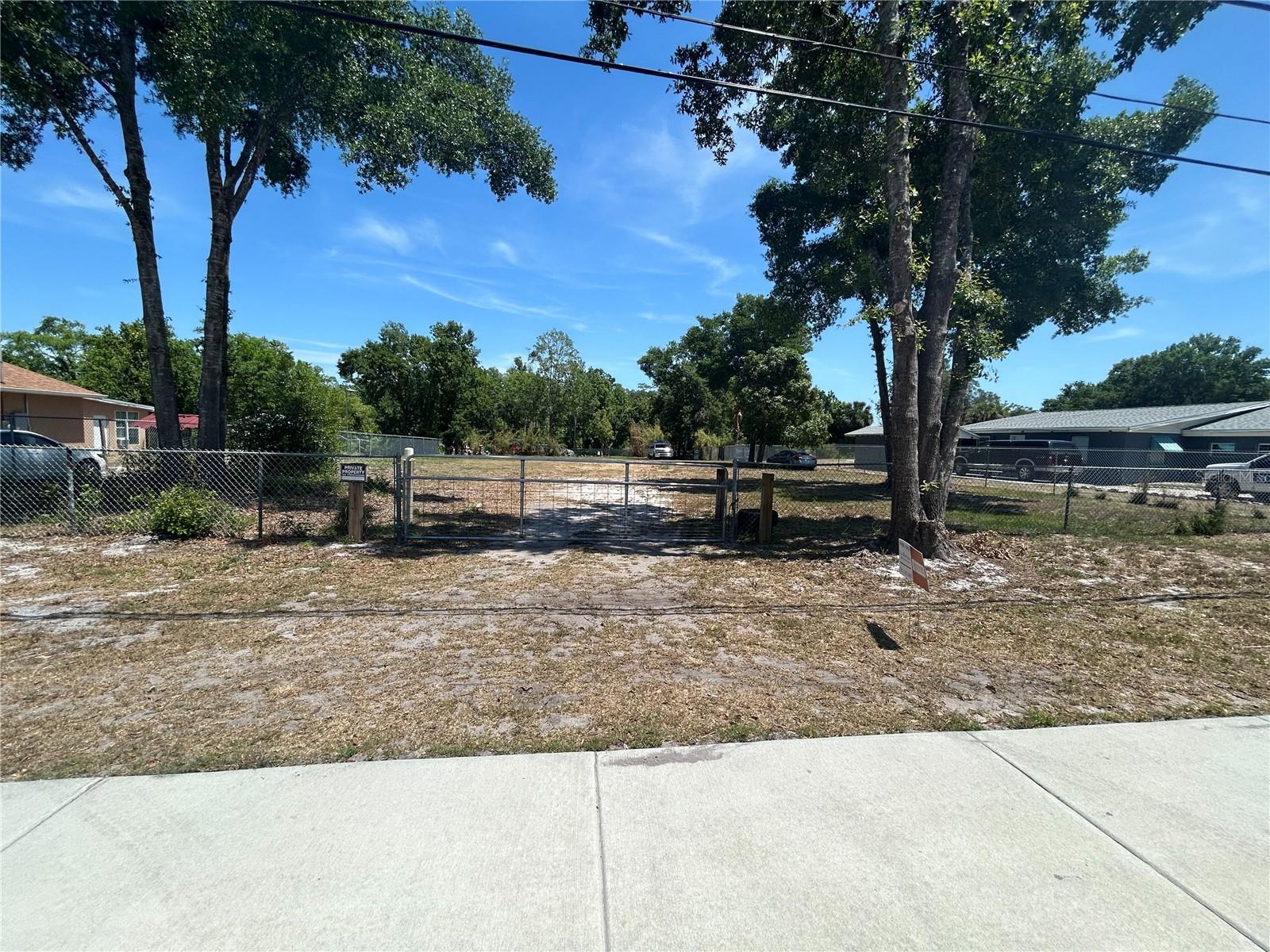 Recently Reduced! You can't miss this amazing .69 Acres of land for Sale in Orlando. This is a 100 x 300 lot, great space to build your dream home and be just minutes of walking distance from E Colonial Dr, restaurants, shops and other amenities.
The Lot is vacant, fenced, cleared, leveled and ready to build. It has a Well, electricity available, the road is paved and the streets have side walks. Come and see it and let your imagination take you to another level!!