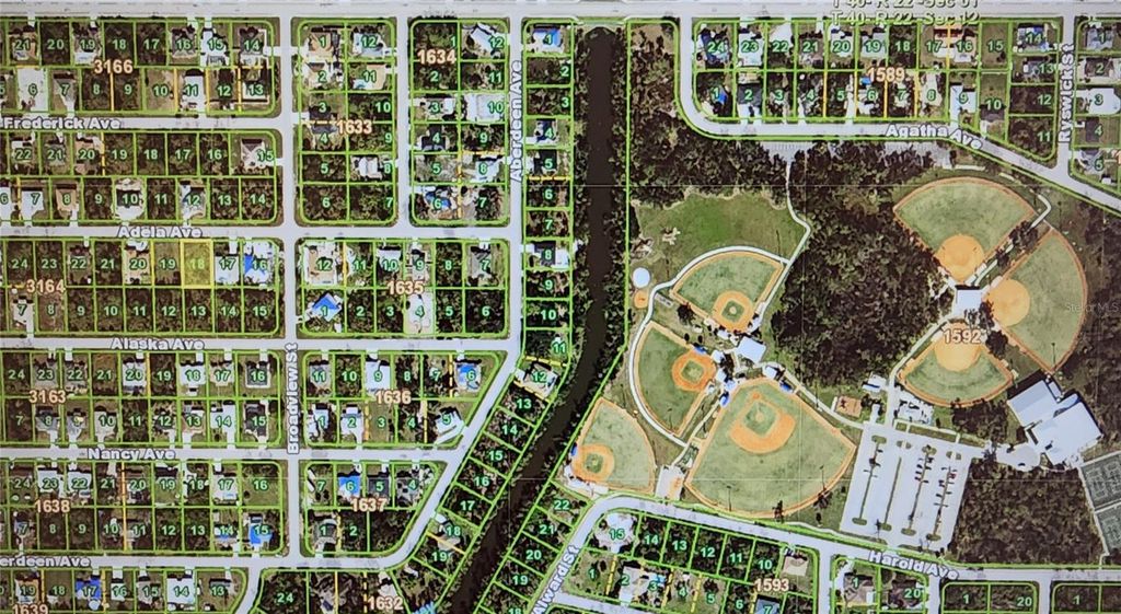 Photo of 23243 Adela Avenue, Port Charlotte, FL 33952 (MLS # C7524208)