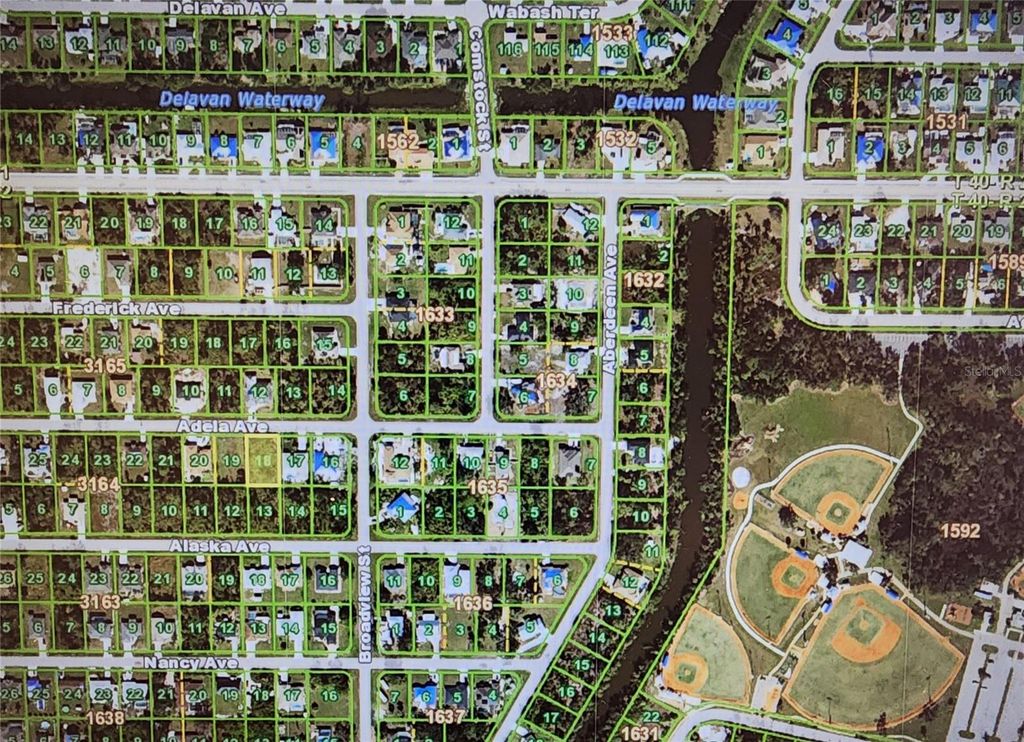 Photo of 23243 Adela Avenue, Port Charlotte, FL 33952 (MLS # C7524208)