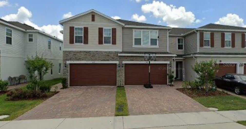 Photo of 1275 Wispy Cypress Drive, Kissimmee, FL 34746 (MLS # O6450610)