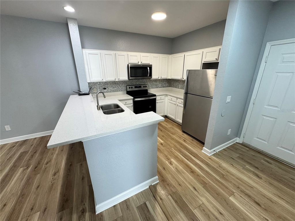 Photo of 3177 Feltrim Place #201, Kissimmee, FL 34747 (MLS # S5142179)