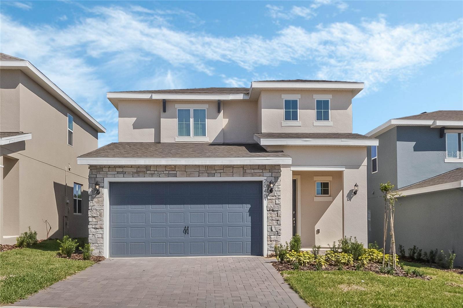 Welcome to a luxurious living experience in the heart of central Florida! This nearly brand-new house for rent offers the epitome of modern elegance, the convenience of a great school district, and a prime location just 3 minutes from the Turnpike. Step inside to discover a spacious, inviting open floor plan designed to maximize comfort and functionality. The main highlight of this home is the primary suite located downstairs, providing a retreat-like sanctuary for relaxation and privacy. The stunning kitchen is a focal point of the home, boasting a beautiful design with a large island that serves as a gathering space for family and friends. You'll find modern interior design elements throughout the house that exude sophistication and style. Nestled in a great school district, additionally, its convenient location provides easy access to the Turnpike, offering seamless connectivity to nearby attractions and amenities. Adding to the appeal, this home boasts the luxury of no rear neighbor, offering enhanced privacy and a serene backdrop for outdoor enjoyment. Don't miss the opportunity to make this exceptional house your new home. Contact us today to schedule a viewing and experience the unparalleled comfort and luxury that awaits you in this remarkable property. Hills of Minneola, a 15-acre Master Plan Community nestled in scenic Lake County, Florida. Our prime location near the new Turnpike Interchange puts you just minutes away from an array of attractions, restaurants, shopping, and entertainment. Whether you're seeking a place to call home or a tranquil retreat amidst beautiful nature, Hills of Minneola offers it all.
