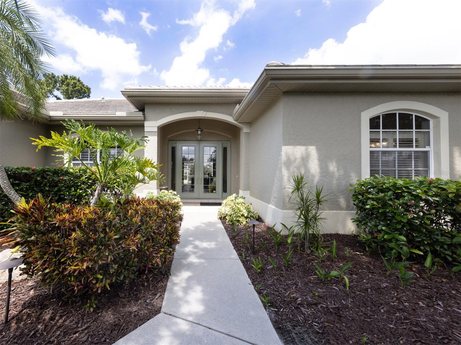 Come live the lifestyle! Nestled in one of the areas most sought after golf course communities, this three bedroom, two bathroom, pool home offers the perfect blend of elegance, comfort, and privacy. As you enter the community with canopy lined streets and mature landscaping, this home truly welcomes you with timeless curb appeal and a tranquil atmosphere. Step inside to discover a light-filled, spacious floor plan designed for both relaxing and entertaining. The kitchen is a cooks delight with new appliances and counter space galore. Plenty of room to entertain your guests. Peace of mind comes standard with recent major upgrades including a new AC unit (2019), roof (2015), new water heater, new electrical panel (2019), and the home has been completely re-piped (2019). The spacious primary suite includes a walk-in closet and a private en-suite bathroom. Two additional bedrooms offer flexibility for guests, a home office, or hobbies. Step outside into your own private oasis with a lush backyard with a sparkling pool, perfect for cooling off on sunny days or hosting unforgettable gatherings. Surrounded by mature trees and greenery, the backyard offers exceptional privacy and tranquility. This home is more than just move in ready, it's a lifestyle upgrade in a friendly, well maintained community with access to golf, scenic views and amenities galore. Venice Golf and Country Club is a premier, gated, member-owned and highly desirable social and very friendly community. The recently renovated and expanded clubhouse, kitchen, bar and state-of-the-art Wellness Center with massage, exercise classes, yoga, physical therapy, and personal training are exceptional amenities for all to enjoy. Renovated 18-hole championship golf course, Har-Tru tennis courts and a Jr. Olympic pool and spa create an active yet relaxing lifestyle. Located in close proximity to Venice Island are beaches, fine dining, shops, cultural events, farmers market, library, art center, museums, biking and boating. Experience all that The Venice Golf and Country Club's lifestyle has to offer. Make sure you put this home at the top of your list. You will be glad you did!