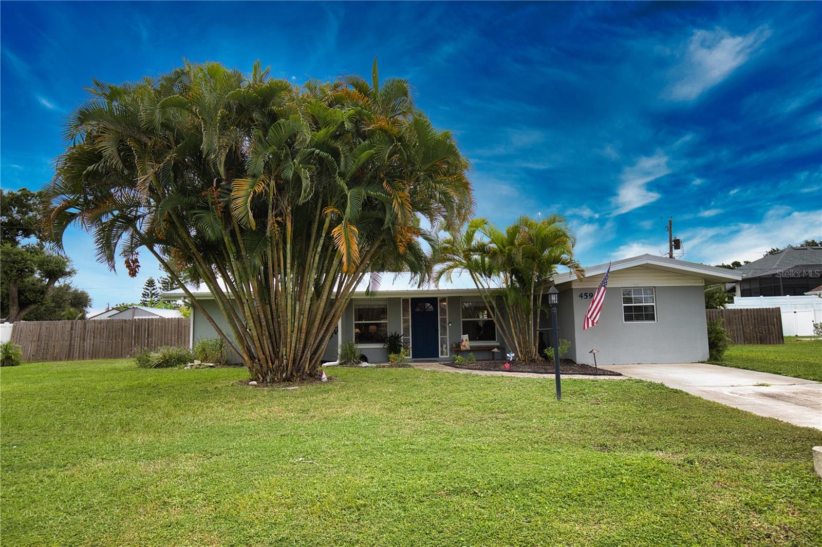 You’ll be hard-pressed to find another home in this condition, at this price, on such a large lot! Move-in ready and sitting on three South Venice lots totaling nearly 1/3 acre, this updated coastal oasis is truly “Home Sweet Home.” Featuring a brand-new metal roof (2023), newer A/C (2022), new water heater (2025), and recent plumbing updates, this property offers peace of mind and lower insurance premiums. The well has also been upgraded with a new peroxide system (2025) and the aerator tank removed, simplifying maintenance and improving water quality. Inside, the heart of the home shines with a completely renovated kitchen—espresso wood cabinets with pull-out drawers, quartz countertops, an undermount sink with upgraded fixtures, and a Samsung stainless steel 4-piece appliance package. Both bathrooms have been refreshed within the past 2 years with new vanities, sinks, and faucets. Step outside to enjoy your private fenced yard, complete with mature tropical landscaping, a large storage shed, and premium Volt landscape lighting that beautifully illuminates the property in the evenings. Relax on the cozy screened-in porch and soak up the Florida lifestyle. Living in South Venice means no HOA or deed restrictions and access (with a nominal fee) to the exclusive neighborhood ferry to South Venice Beach, as well as a private boat/kayak ramp. Nearby, you’ll find world-class beaches, charming downtown Venice, and Shamrock Park with tennis courts, playgrounds, trails, and access to the Venetian Waterway. With all the thoughtful upgrades, attention to detail, and unbeatable location, this is the home you’ve been waiting for—bring your buyers and offers today! Home is owned by Listing Broke. r