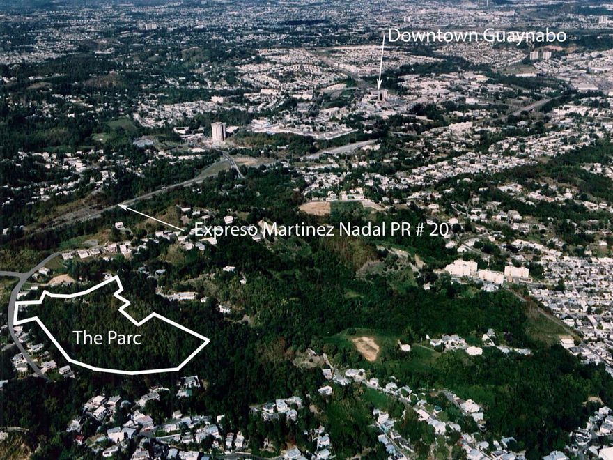 Discover a premier investment opportunity at The Parc, a 12.1-acre hillside parcel of raw land zoned for high-density residential development and previously approved for 204 multi-family units. This exceptional property offers stunning panoramic city and mountain views and is strategically located just off the Piedras Blancas exit of the Martinez Nadal expressway, providing excellent connectivity throughout the region. Only minutes from downtown Guaynabo, residents will enjoy convenient access to vibrant shopping, diverse dining, and engaging entertainment options. The site has sewer and utility access points available, significantly streamlining the development process. Surrounded by top-rated schools and suburban neighborhoods, The Parc blends urban convenience with natural beauty, making it an ideal location for a landmark residential community. Contact us today to explore this outstanding development opportunity.