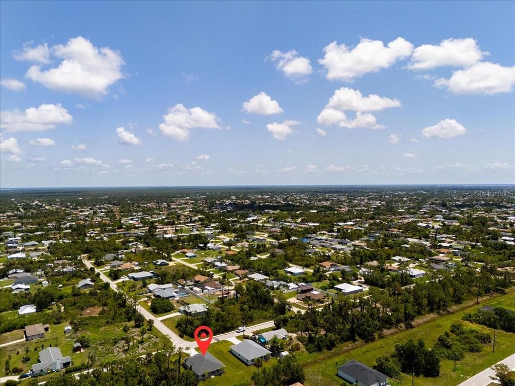 Photo of 9065 Fruitland Avenue, Englewood, FL 34224 (MLS # TB8459299)