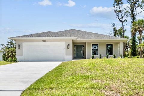Photo of 9065 Fruitland Avenue, Englewood, FL 34224 (MLS # TB8459299)