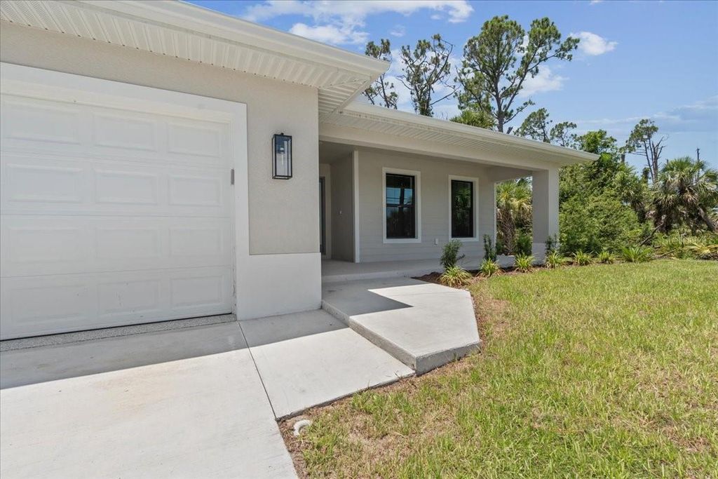 Photo of 9065 Fruitland Avenue, Englewood, FL 34224 (MLS # TB8459299)