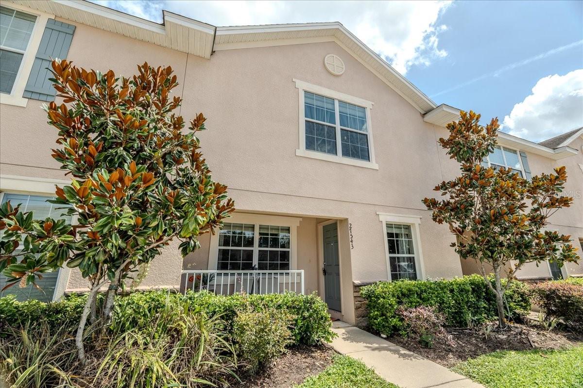 This spacious townhome features 3 bedrooms and 2.5 bathrooms, providing ample space for singles, growing families, or those looking to settle down. Nestled within a secure gated community, this residence offers peace of mind and safety, with the community pool just steps away—perfect for cooling off on those hot summer days.
Step inside to discover high-end finishes throughout. The large kitchen boasts stunning granite countertops and rich dark wooden cabinets, complemented by stainless steel appliances, including a brand-new dishwasher (2024). A new clothes washer was also added in 2024, conveniently located in the upstairs hallway for easy access from all bedrooms. Elegant ceramic tile flows seamlessly through the kitchen, dining room, and bathrooms, enhancing the home's stylish ambiance.
The expansive primary suite is designed for comfort, easily accommodating a king-size bed along with a full complement of bedroom furniture. Enjoy the convenience of a walk-in closet and a luxurious bathroom featuring double sinks and a beautifully tiled stand-up shower. The two additional bedrooms are generously sized, ideal for family or guests, or perfect for transforming into an office space or workout room.
Step outside to your private screened-in lanai, where you can unwind and take in the serene views of lush greenery and trees. A spacious storage room connected to the lanai provides ample space for beach chairs, lawn equipment, or any other essentials. This home also includes two dedicated parking spaces, with additional community parking available nearby.
And around the corner is a community hub called The Grove, where restaurants, shops, a gym, and movie theatre are located. Come by and check out this fantastic home!
