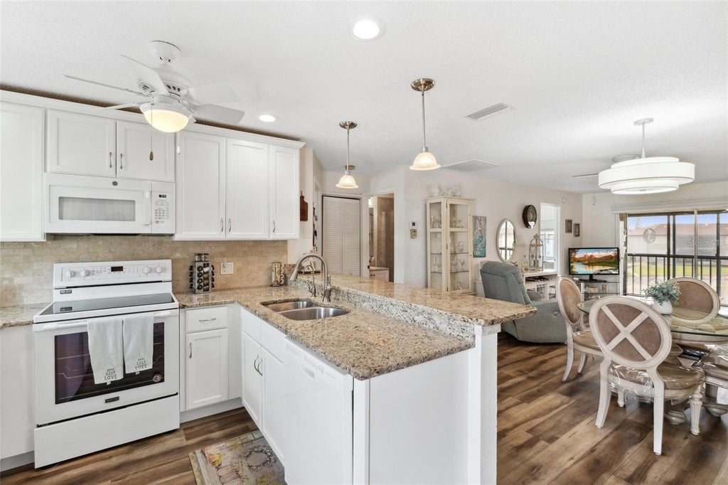 Photo of 25100 Sandhill Boulevard #R-201, Punta Gorda, FL 33983 (MLS # C7532565)