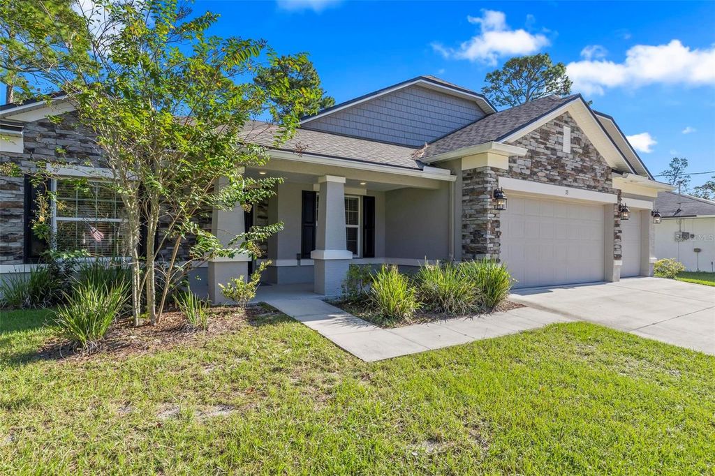 Photo of 73 Fairbank Lane, Palm Coast, FL 32137 (MLS # FC318128)