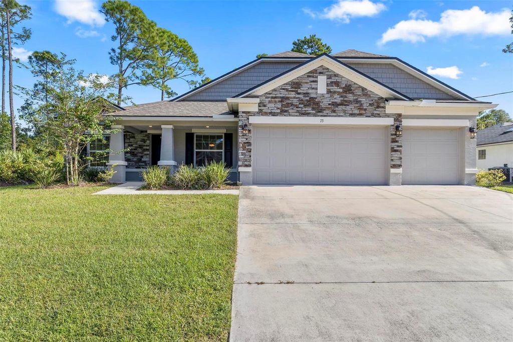 Photo of 73 Fairbank Lane, Palm Coast, FL 32137 (MLS # FC318128)
