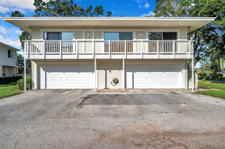 Discover this inviting 2-bedroom, 1-bath end unit with a shared garage, offering a great blend of comfort and convenience. Spacious bedrooms feature walk-in closets, while the remodeled kitchen (2021) showcases soft-close oak cabinetry, quartz countertops, upgraded fixtures, and modern LED lighting.

Recent improvements include a new roof and balcony (2020) and a 2018 AC, giving you confidence and comfort year-round. The open-concept living and dining area is highlighted by vaulted ceilings that enhance the sense of space, along with durable vinyl plank flooring in the main living areas.

Step through the full-wall sliders onto an oversized balcony with peaceful pool views, an ideal spot to start your day or unwind in the evening.

Eastwood Shores residents enjoy a range of amenities including a pool, fishing dock, fitness trail, and tennis courts. Conveniently located just minutes from shopping, dining, and Clearwater’s renowned beaches.

The monthly maintenance fee covers water, sewer, trash, roof, pool, building exterior, insurance, and reserves, making ownership simple and predictable.

All ages are welcome. Up to two pets allowed. One-year ownership required prior to leasing.

Come see the opportunity and make this space your own.