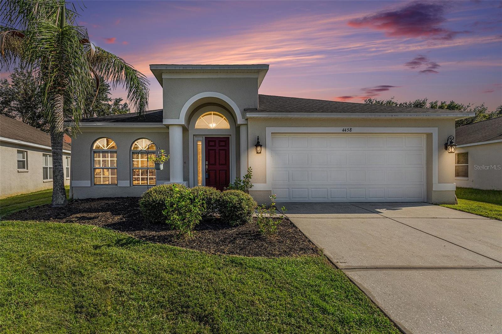 Welcome to this beautifully maintained four-bedroom, two-bathroom gem situated in the gated, golf community of Hernando Oaks. With a brand-new roof (2023), 2 car garage, and high-quality wood-look vinyl flooring throughout, this home combines modern elegance with timeless comfort. Upon entering, you’ll be greeted by a spacious foyer that leads to a bright and airy front living/dining area, bathed in natural light. Continue through the hallway to the heart of the home: a generous open floor plan that seamlessly integrates the family room, dining area, and kitchen. High, vaulted ceilings enhance the sense of space, while ceiling fans throughout ensure comfort in every season. The open kitchen is a chef’s delight, featuring granite countertops, a breakfast bar with stylish pendant lighting, and upgraded stainless steel appliances. With an abundance of cabinets for storage, a convenient coffee bar, and plenty of workspace, this kitchen is both functional and inviting. The vaulted ceilings continue into the primary bedroom, creating a serene retreat with a walk-in closet and a private attached bathroom. This luxurious space boasts a double sink granite vanity with an updated light fixture, a soaking tub, and a glass-enclosed tiled shower with a rain showerhead. The private water closet adds an extra touch of convenience. The primary suite also offers its own access to the outdoor patio, providing a perfect spot for morning coffee or evening relaxation. The three additional bedrooms are well-sized and comfortable, with the second bathroom featuring a double sink granite vanity and updated light fixtures. Through sliding glass doors, step out onto the covered back patio where you can enjoy views of nature, perfect for grilling or simply enjoying the Florida weather. Hernando Oaks is a golf cart-friendly community with an 18-hole golf course, offering a fantastic lifestyle for golf enthusiasts. The home is conveniently located near shopping centers, restaurants, and is just a short drive from Weeki Wachee Springs and Gulf beaches. Don’t miss your opportunity to make this stunning Hernando Oaks property your new home.