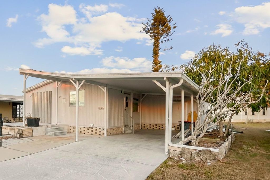 Photo of 143 Rarotonga Road, North Port, FL 34287 (MLS # TB8474316)