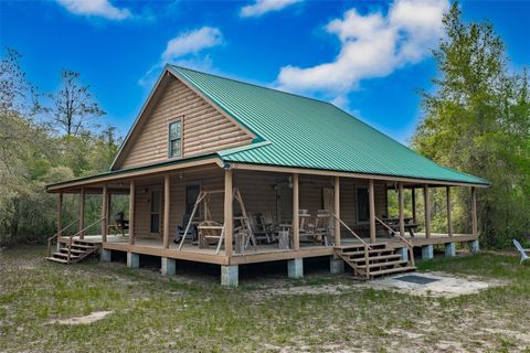 Photo of 20259 NE 147th Terrace, Fort Mccoy, FL 32134 (MLS # OM707792)