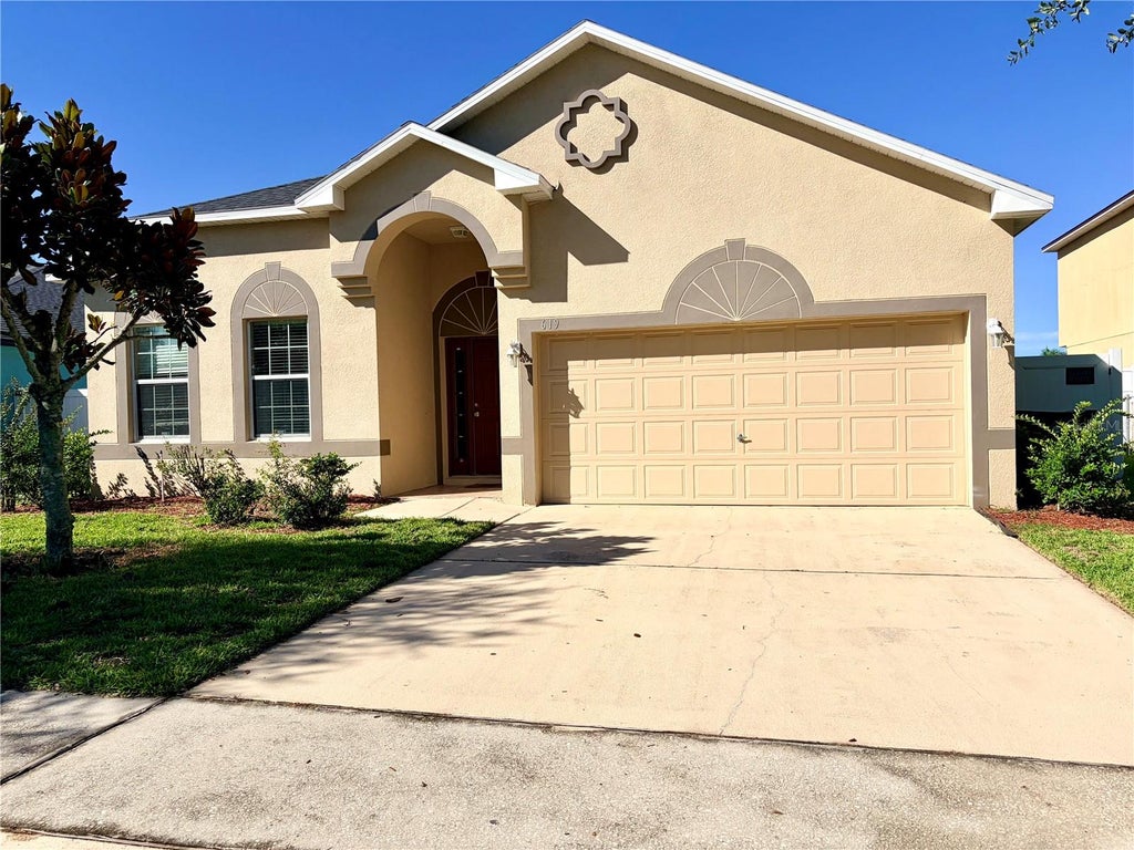 Photo of 619 Kermarah Avenue, Haines City, FL 33844 (MLS # OM731883)
