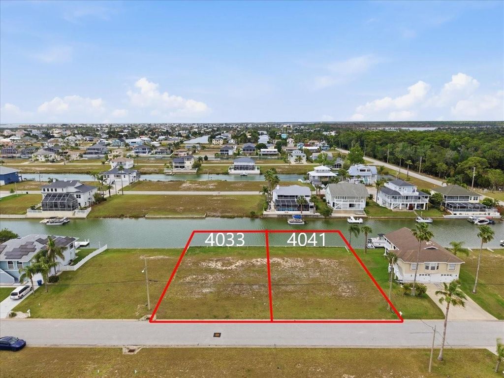 Photo of 4033 Triggerfish Drive, Hernando Beach, FL 34607 (MLS # TB8500735)