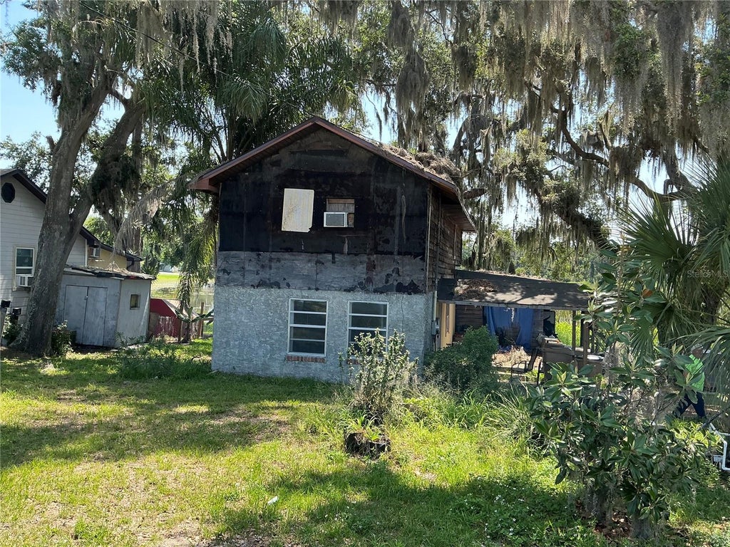 Photo of 15100 Timber Village Road, Groveland, FL 34736 (MLS # S5158504)