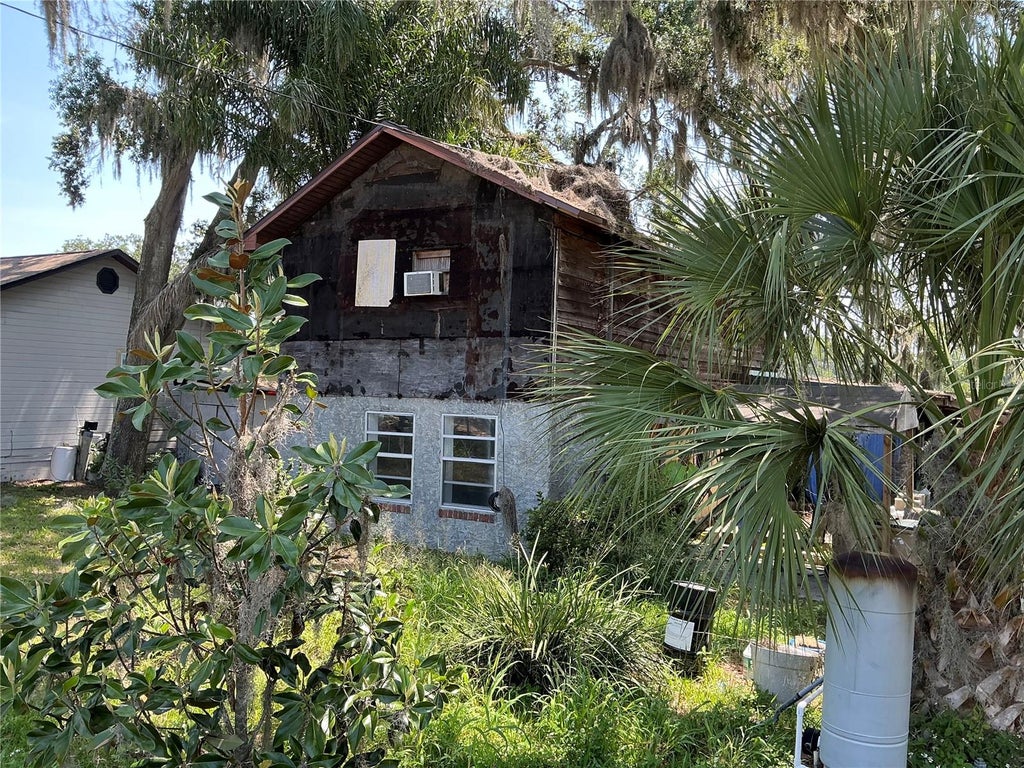Photo of 15100 Timber Village Road, Groveland, FL 34736 (MLS # S5158504)