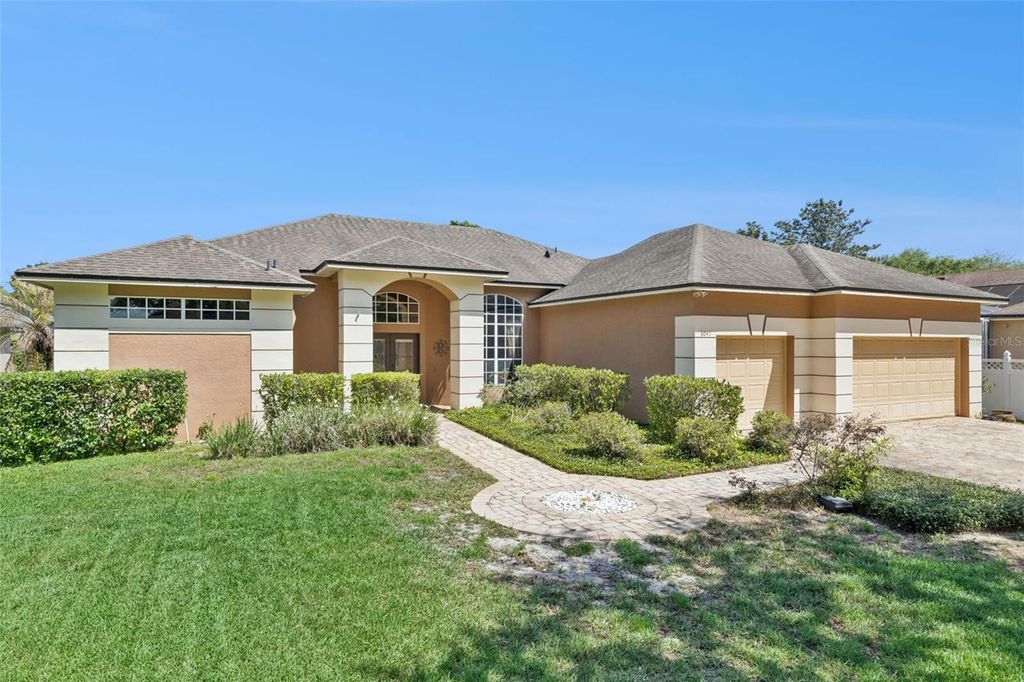 Photo of 8041 Monier Way, Orlando, FL 32835 (MLS # O6400639)