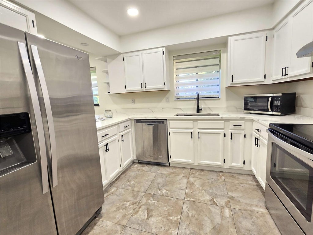 Photo of 2009 Hammock Pine Boulevard #2009, Clearwater, FL 33761 (MLS # TB8484773)